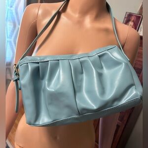 Small blue purse.  Purchased but never used